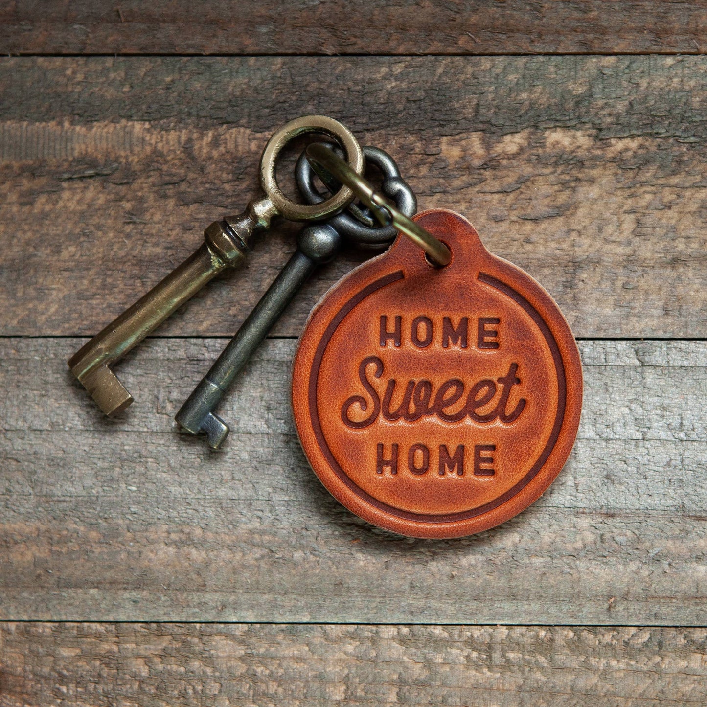 Load image into Gallery viewer, Home Sweet Home Leather Keychain Circle
